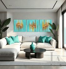 Living room with a large white sectional sofa, turquoise pillows, and a round coffee table, three turquoise minimalist paintings on the wall, and a large window with an ocean view. The paintings feature sea shells in gold, copper and yellows shades, and turquoise teal background, inspired by the Maldivian - Caribbean turquoise waters.