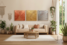 Modern living room with beige sofa, decorative pillows, and 3d gold copper silver wall art by Julia Apostolova