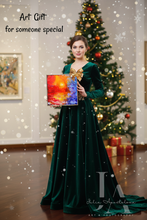 Woman in a green dress holding a colorful painting with a Christmas tree in the background