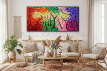Living room with a colorful forest abstract painting on the wall, original art by artist Julia Apostolova