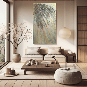 A modern and minimalist living room with neutral-colored furniture, including sofas and a low wooden coffee table . The room features gold abstract artwork on the walls and large windows that let in natural light , creating a serene and calming atmosphere