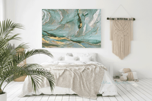 Modern bedroom with plant, macrame wall hanging, and sage green gold abstract artwork, by artist Julia Apostolova.