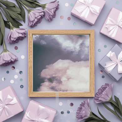 Framed artwork with purple flowers and gift boxes on a light purple background