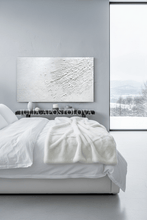 Modern bedroom with a bed, nightstand, a winter view, and a large white minimalist abstract painting with 3d textures, by artist Julia Apostolova.