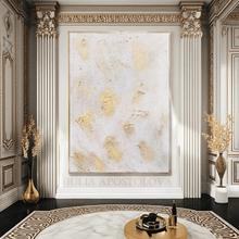 Decorative painting with gold accents in an elegant room with classical architecture.