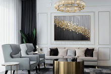 Modern living room with gray armchairs, a gold coffee table, and a gold leaf abstract painting, by artist Julia Apostolova.