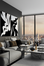 Modern living room with abstract art, gray sofa, and cityscape view