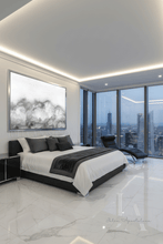 Modern bedroom with city skyline view, bed, and a large white clouds painting by artist Julia Apostolova, The minimalist artwork with scandinavian style adds an extra touch of class.