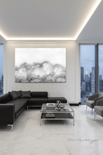 Modern living room with black sectional sofa, glass coffee table, cityscape view, and a large cloud painting by artist Julia Apostolova, with white gray colors and minimalist style.
