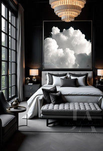 Black White Cloud Art in Classic style bedroom. Large black white cloud painting, by Julia Apostolova on the wall, a low couch surrounded by cushions. 
The room features dark gray black tones, and minimalist modern decor, creating a calming and harmonious atmosphere.
