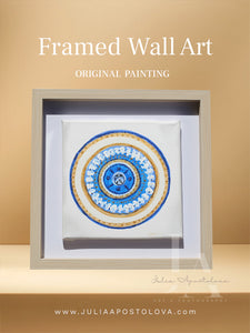 A greek eye original painting with glitter gold and blue color scheme, framed in a simple, wooden frame. Will be perfect elegant gift for someone special.