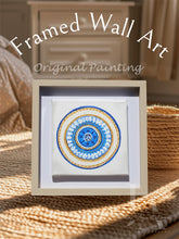 A greek eye original painting with glitter gold and blue color scheme, framed in a simple, wooden frame. Will be perfect elegant gift for someone special.