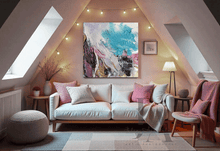 Living room with a white sofa, colorful abstract painting, and decorative items.