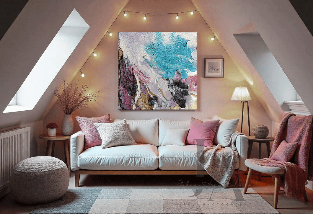 Living room with a white sofa, colorful abstract painting, and decorative items.