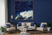 Living room with a blue wall, cloud painting with navy blue sky and white clouds, white sofa, with decorative cushions.