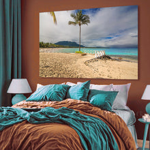Bedroom with a large beach scene painting on the wall
