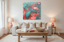 Living room with a colorful coral green abstract painting on the wall, white sofa, wooden coffee table, and decorative items.