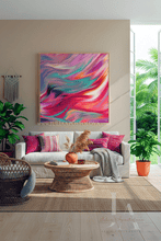 Living room with a colorful abstract painting on the wall, a sofa with cushions, and decorative elements.