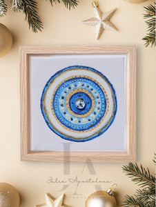 An original elegant abstract greek eye painting in mandala-like design with concentric circles in shades of blue , gold, and white against a neutral background. Perfect greek evil eye art gift for protection, for Christmas, Valentine's Day, Birthday, and any occasion. 