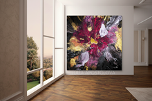 Abstract Floral painting on a wall in a room with a view of trees