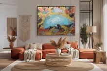 Modern living room with orange sofa, wicker coffee table, and colorful abstract painting.