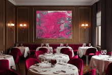 A large abstract painting by Julia Apostoloa hangs on a dark wood-paneled wall in an elegant restaurant. The artwork features vibrant magenta, fuchsia pink, and silver marbled patterns.