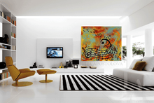 Modern living room with a colorful abstract painting on the wall.