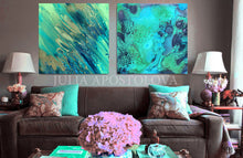 Living room with a brown sofa, teal blue abstract paintings on the wall, and decorative items.