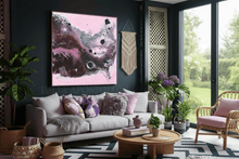 Modern living room with a gray sofa, abstract painting by artist Julia Apostolova, decorative elements, boho decor, and garden view