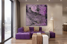 Modern living room with a purple sofa and purple abstract painting on the wall.
