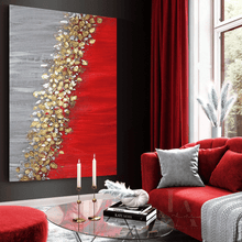 Living room with a red and gold abstract painting, red sofa, and glass coffee table.