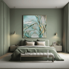Modern bedroom with sage green walls, a bed, and abstract art above.
