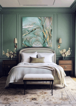 Luxurious bedroom with sage green walls, a large abstract painting, and elegant decor.
