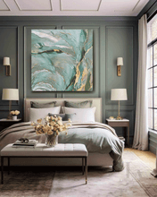 Modern bedroom with abstract art, bed, and decor. The painting features sage green, gold, teal colors and shining gold leaf embellishments, by artist Julia Apostolova