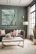 Living room with gray walls, a gray sofa, marble coffee table, and sage green gold abstract artwork, by artist Julia Apostolova.