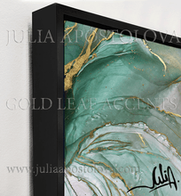Abstract art with gold leaf accents in a black frame, signed by Julia Apostolova.