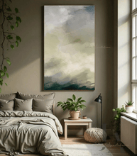 Modern bedroom with a large sage green abstract painting on the wall, plants, and soft lighting.
