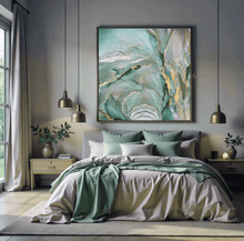 Modern bedroom with a bed, vases, lamps, decorative elements, and a large sage green floral abstract painting on the wall with gold leaf by artist Julia Apostolova.
