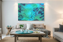 An abstract canvas wall art print featuring vibrant turquoise, teal, and green fluid marble patterns with dark purple accents, displayed in a modern living room setting above a beige sofa.