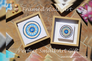 Two framed wall art pieces featuring colorful mandala designs with intricate blue white and gold patterns. Ideal art gift for Christmas, Valentine's Day, Birthday, and any occasion. 