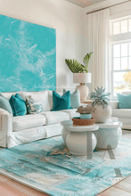 Modern living room with white sofa, turquoise pillows, and a large turquoise wall art painting by artist Julia Apostolova.