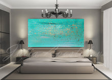 Modern bedroom with a large abstract turquoise painting on the wall, chandelier, and bed.