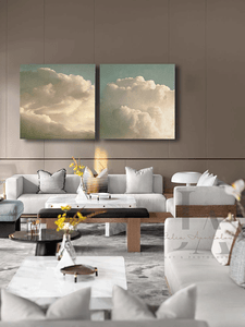 Two Abstract Paintings, Vintage Cloud Wall Art, Canvas Print Wall Art Set over coach in livingroom setting, Nordic Style, Boho Decor, set of two, cloud paintings, 2 wall art for bohemian decor, scandinavian design, minimal wall art, minimalist painting, cloudscape wall art, dreamy art, scandinavian art, nordic design, scandinavian design style, julia apostolova, sage green, beige colors, oil painting print, modern wall decor, wall art decor, wall art, contemporary two abstract prints, modern decor