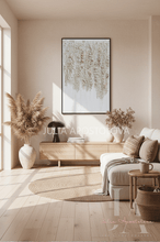 Modern living room with neutral decor, including a sofa, coffee table, and white gold wall art with 3d textures, by artist Julia Apostolova