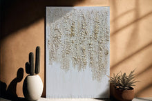 White Gold Abstract textured painting on a beige wall with minimal decor